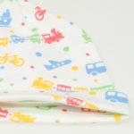  White baby hat with tassel with transport toys print | liloo