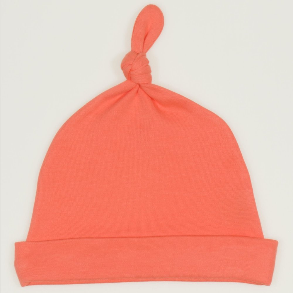 Salmon living coral baby hat with tassel | liloo