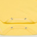 Minion yellow long-sleeve bodysuit with cow print  | liloo