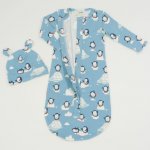 Aqua organic cotton sleeping bag and baby hat with ears with penguins print | liloo