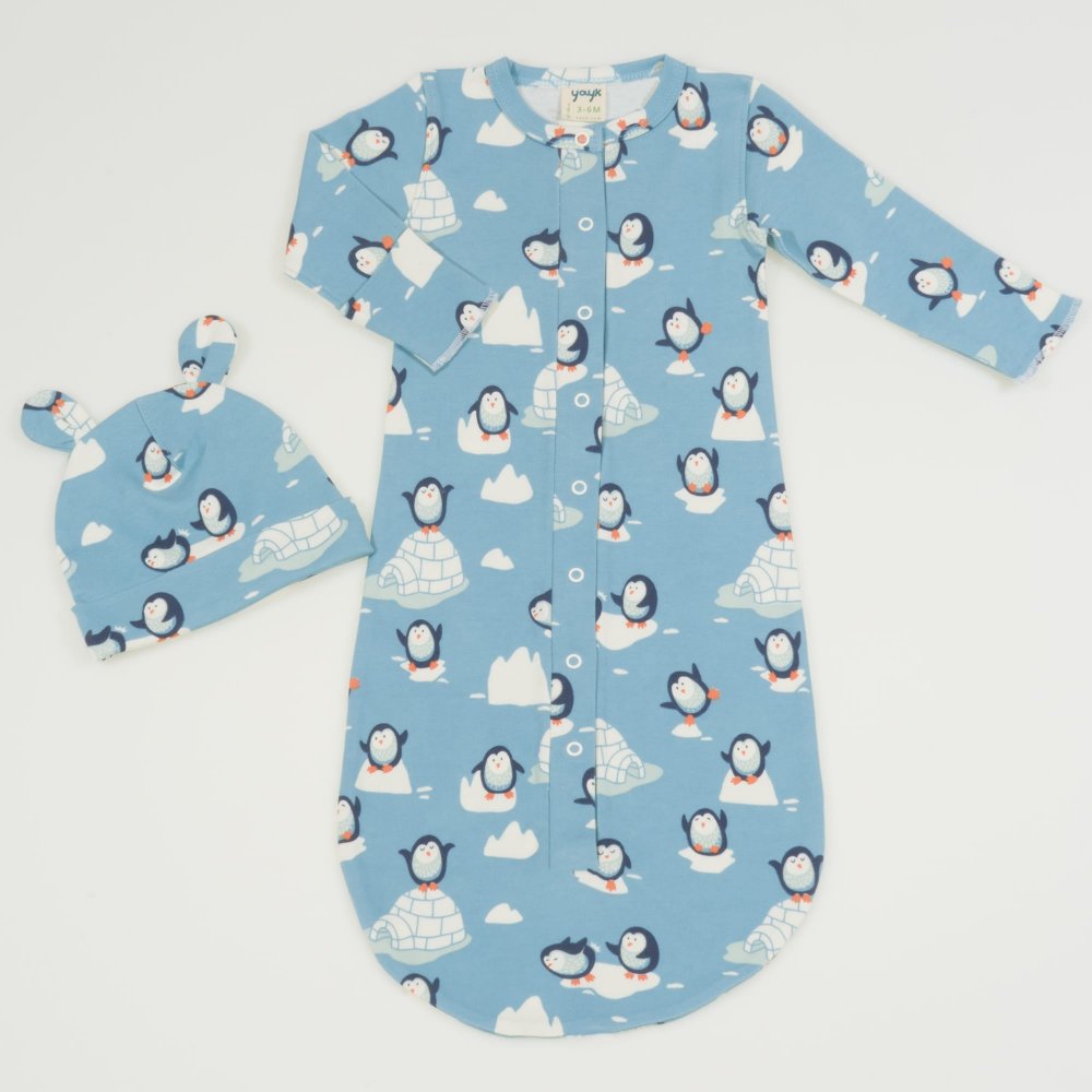 Aqua organic cotton sleeping bag and baby hat with ears with penguins print | liloo