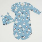 Aqua organic cotton sleeping bag and baby hat with ears with penguins print | liloo