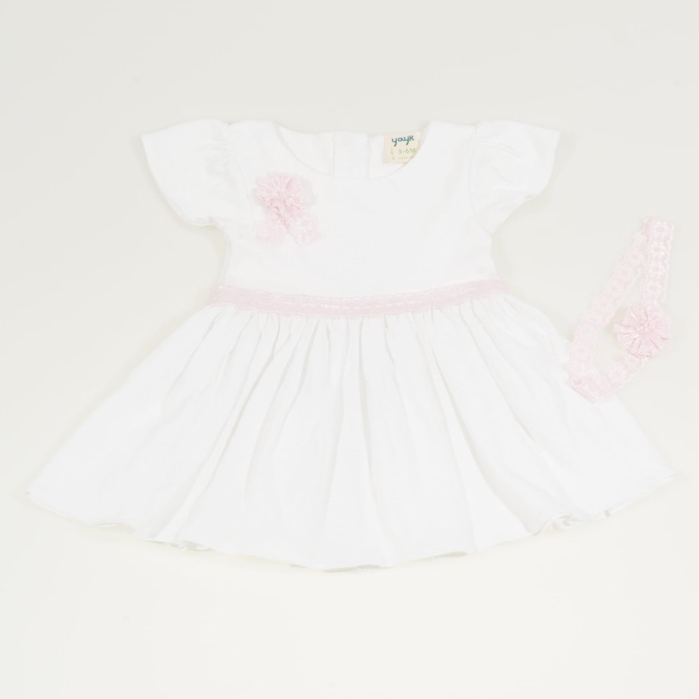 White organic cotton christening dress with pink bow and headband | liloo