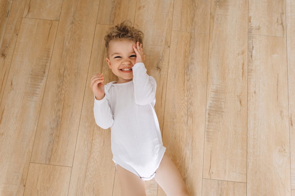 Boy dressed in bodysuit