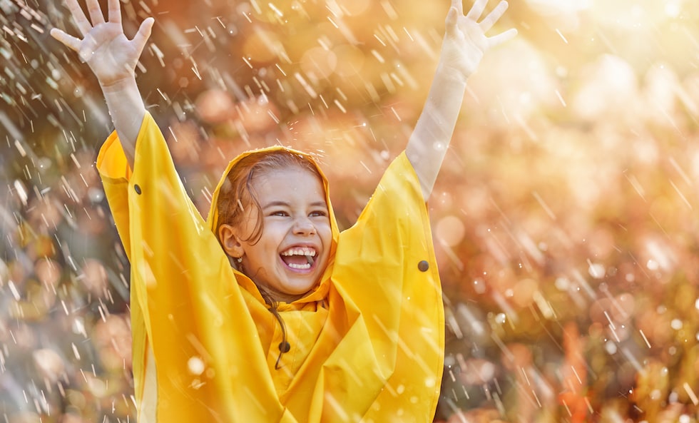 Kid-enjoying-the-rain 