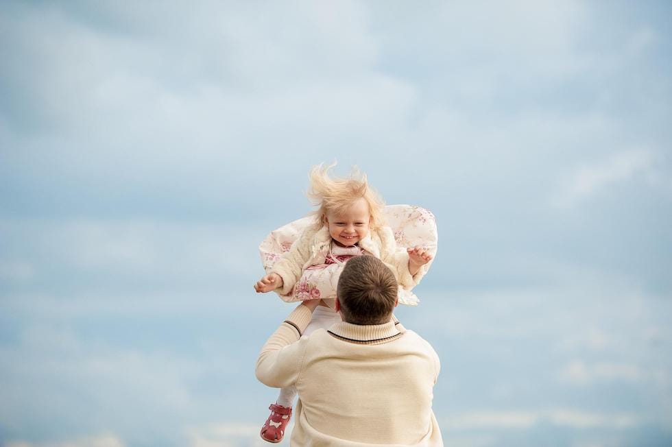 Dad playing with the baby 1