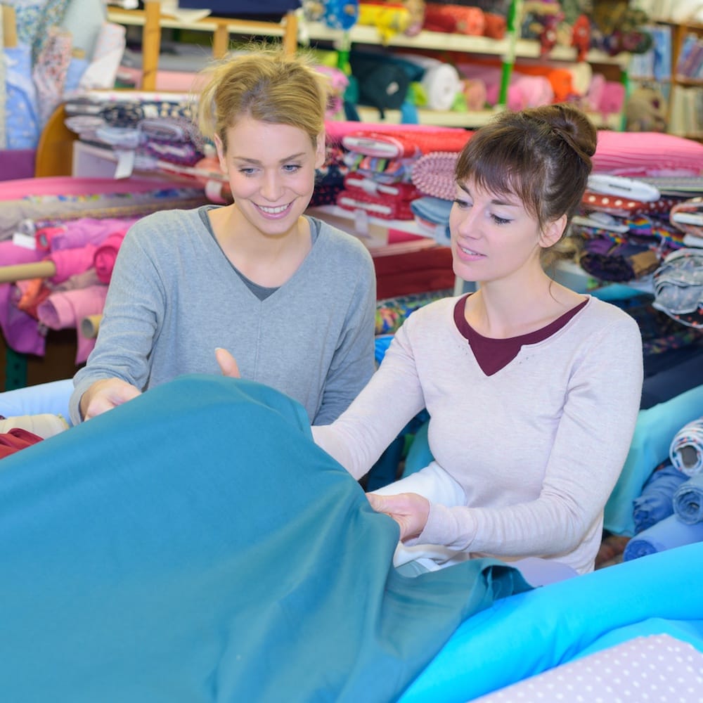 Women choosing fabric