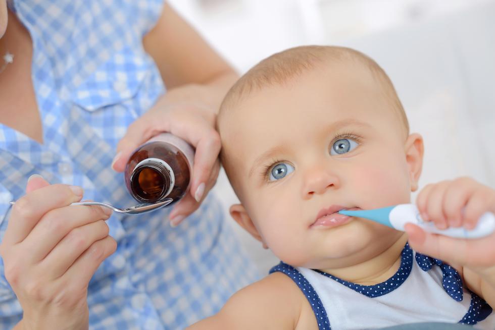 Boy with thermometer in his mouth 1