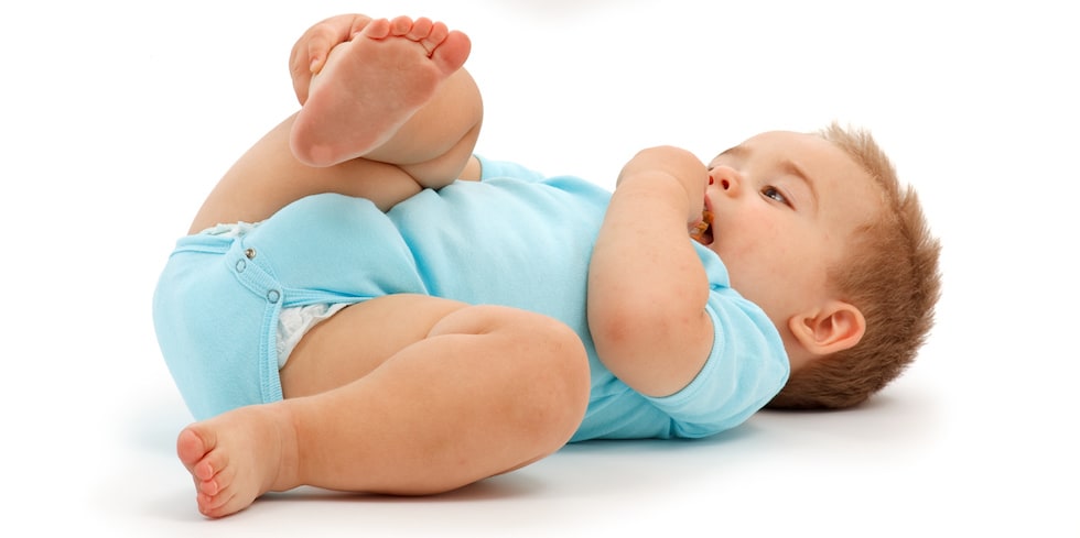 Baby boy with light blue bodysuit